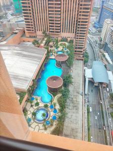 an overhead view of a swimming pool in a building at Holiday at Times Square KL in Kuala Lumpur