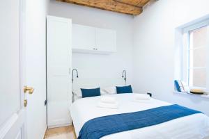 Postel nebo postele na pokoji v ubytování Apartments Allegra