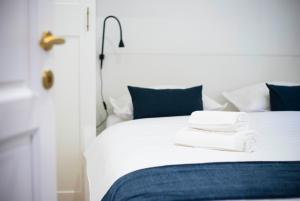 Postel nebo postele na pokoji v ubytování Apartments Allegra