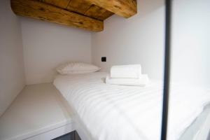 Postel nebo postele na pokoji v ubytování Apartments Allegra