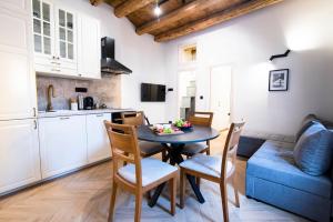Kuchyň nebo kuchyňský kout v ubytování Apartments Allegra