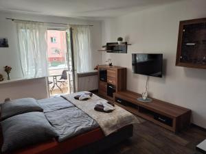 מיטה או מיטות בחדר ב-Apartmán Lenka