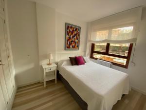 Ένα ή περισσότερα κρεβάτια σε δωμάτιο στο Apartamento Los Chopos