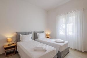 Postel nebo postele na pokoji v ubytování Satori Boutique Hotel