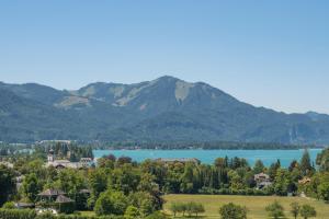 a view of a lake and mountains at Wolfgangsee Appartements in Strobl