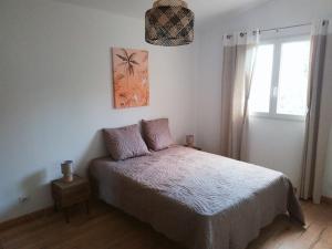 Postelja oz. postelje v sobi nastanitve Très belle maison F3- 63 m² en Corse