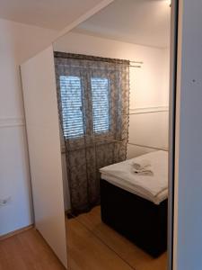 Posteľ alebo postele v izbe v ubytovaní Apartment ELLY