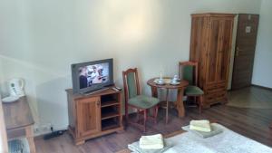 TV a/nebo společenská místnost v ubytování Bakster