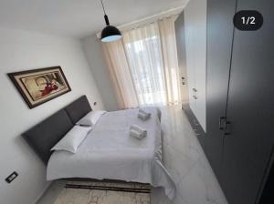 Postel nebo postele na pokoji v ubytování Best Apartments