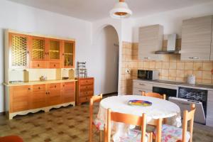 O bucătărie sau chicinetă la Alghero- Lungomare Via Lido Cozy Flat W/Parking!