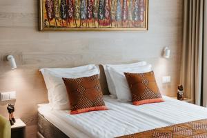 Postel nebo postele na pokoji v ubytování Old Hapsal Hotel