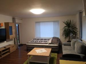 A seating area at Apartment Schwarzindien