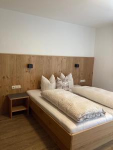 Posteľ alebo postele v izbe v ubytovaní Apart Jehle