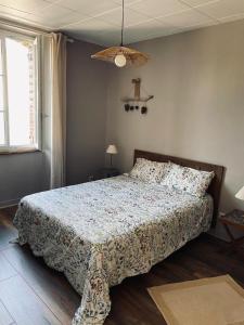 Postel nebo postele na pokoji v ubytování Gite Pomme de pin
