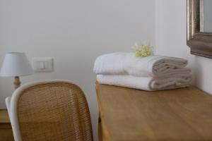 Postel nebo postele na pokoji v ubytování Elios by PortofinoHomes