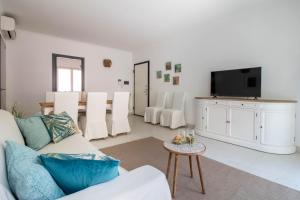 TV a/nebo společenská místnost v ubytování Elios by PortofinoHomes