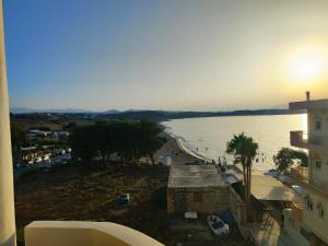 a view of a body of water from a building at THALIA APARTMENTS CHANlA in Chania