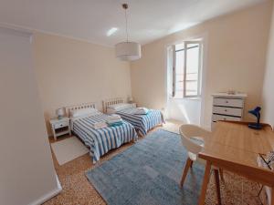 A bed or beds in a room at Il veliero