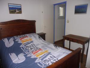 Quino Calou tesisinde bir odada yatak veya yataklar