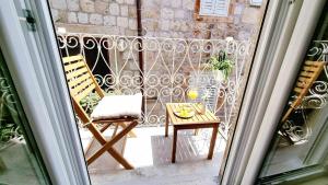 Ein Balkon oder eine Terrasse in der Unterkunft Mascheroni Luxury Rooms