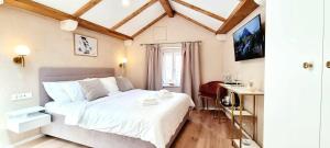 Ein Bett oder Betten in einem Zimmer der Unterkunft Mascheroni Luxury Rooms