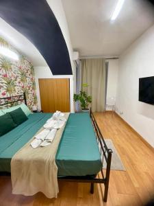 Ένα ή περισσότερα κρεβάτια σε δωμάτιο στο Minihome apartment