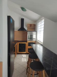 A kitchen or kitchenette at Apartments Villa Dalmatina
