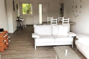 Posezení v ubytování Ferienwohnung zur dicken Berta