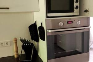 Kuchyň nebo kuchyňský kout v ubytování Ferienwohnung zur dicken Berta