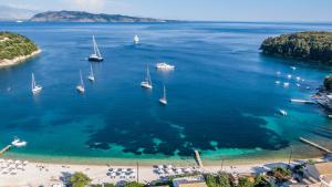 a group of boats in a large body of water at Kalami Beach - Villa Kouloura in Kalami