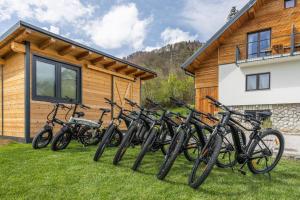 a group of bikes parked in front of a building at Hiša Vally Art in Bled