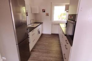 Kuchyň nebo kuchyňský kout v ubytování Ferienwohnung zur dicken Berta