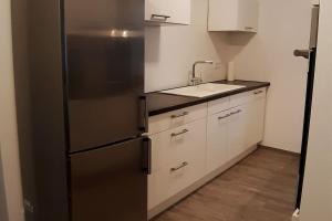 Kuchyň nebo kuchyňský kout v ubytování Ferienwohnung zur dicken Berta