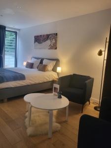 Postel nebo postele na pokoji v ubytování Table et chambre particulière