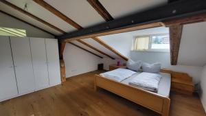 a bedroom with a bed in a attic at Wohnung Panoramablick in Seefeld in Tirol