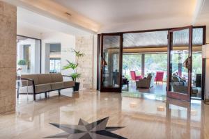 a living room with a star on the floor at Hotel Hostalillo by Escampa Hotels in Tamariu