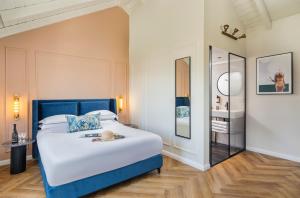 Voodi või voodid majutusasutuse Villa Albi - Machne Yehuda Hotel toas