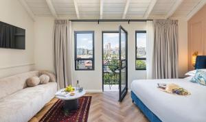 Voodi või voodid majutusasutuse Villa Albi - Machne Yehuda Hotel toas