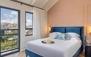 Voodi või voodid majutusasutuse Villa Albi - Machne Yehuda Hotel toas