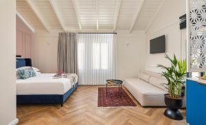 Voodi või voodid majutusasutuse Villa Albi - Machne Yehuda Hotel toas