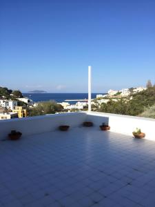 a balcony with a view of the ocean at L'Isolana Case Vacanza Villa Alessia in Ponza