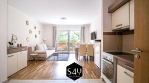 A kitchen or kitchenette at Alpe Adria Apartments - Top 11 by S4Y
