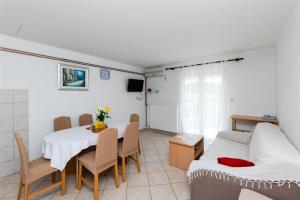 Postel nebo postele na pokoji v ubytování Apartments Boza
