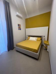 Cama o camas de una habitación en Dimora Chiaia 209