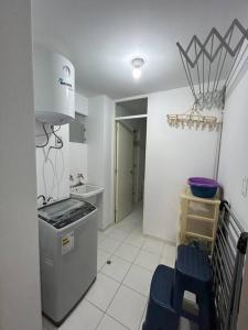 A kitchen or kitchenette at Apartamento Mar Naplo