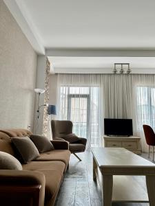 TV a/nebo společenská místnost v ubytování Aparthotel Kutaisi