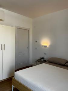 Postel nebo postele na pokoji v ubytování CASADOMA Casa Vacanza - B&B