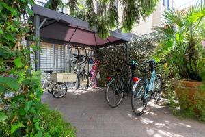 a group of bikes parked outside of a building at New Pescara City b&b in Pescara