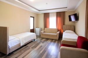Letto o letti in una camera di Hotel Smile