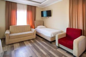 Letto o letti in una camera di Hotel Smile